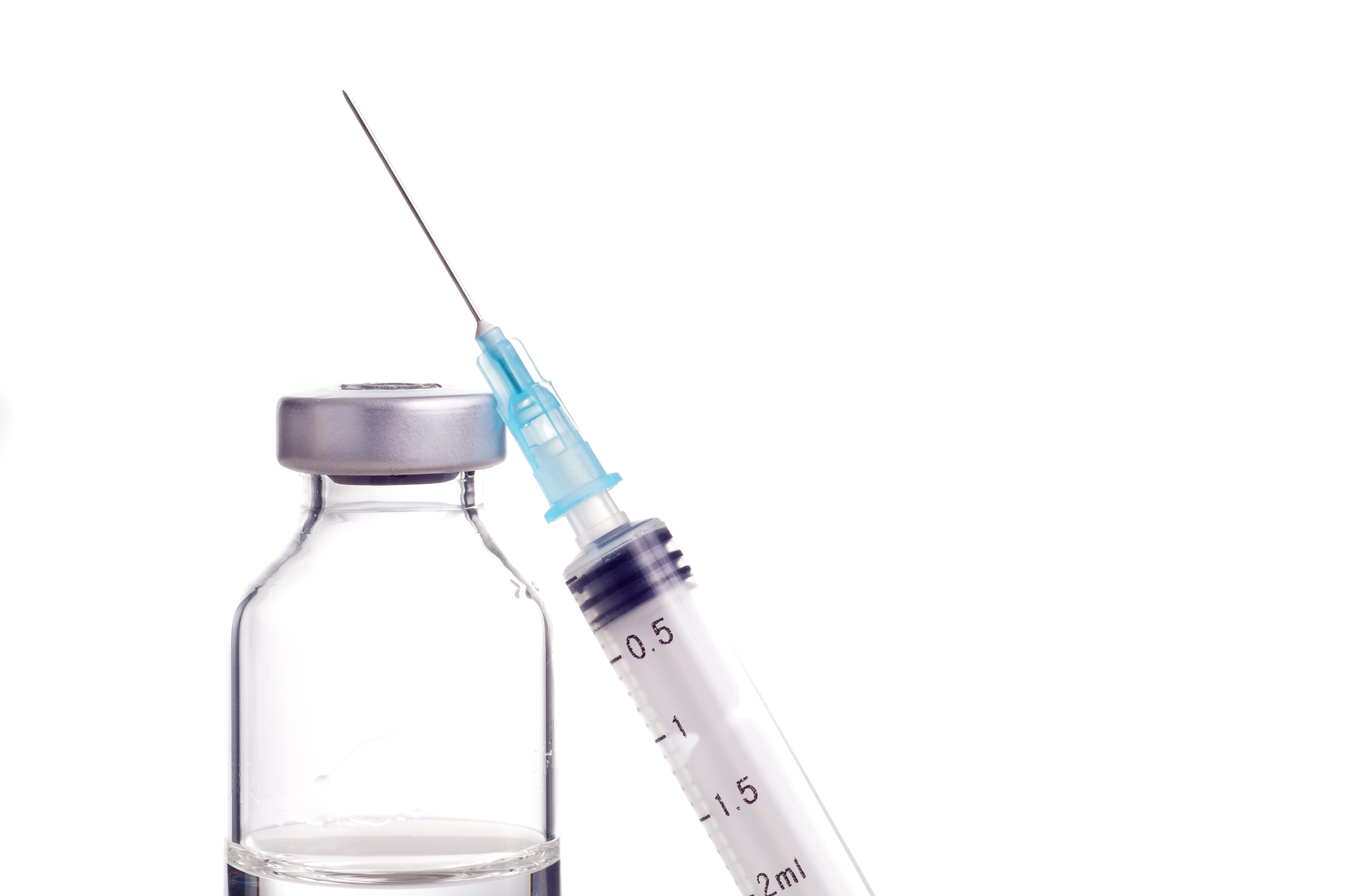 Jeringa con tratamiento inyectable para la fase aguda de la enfermedad de Peyronie y frasco de medicamento con tapa metálica